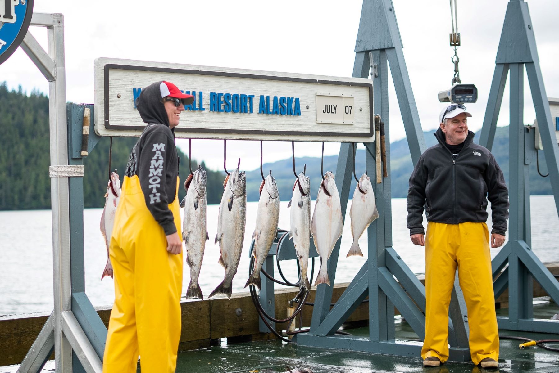 Guests show off their daily catch at a fishing lodge in Alaska